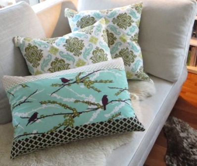 Dekokissen zierkissen oliv vögel birds ornamente grün türkis quasten aqua